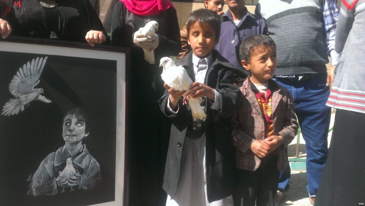 A_blind_child_carries_a_dove_at_a_protest_against_the_attack_on_the_al-Nour_Center_for_the_Blind_in_Sanaa_-_Yemen_-_10-Jan-2016