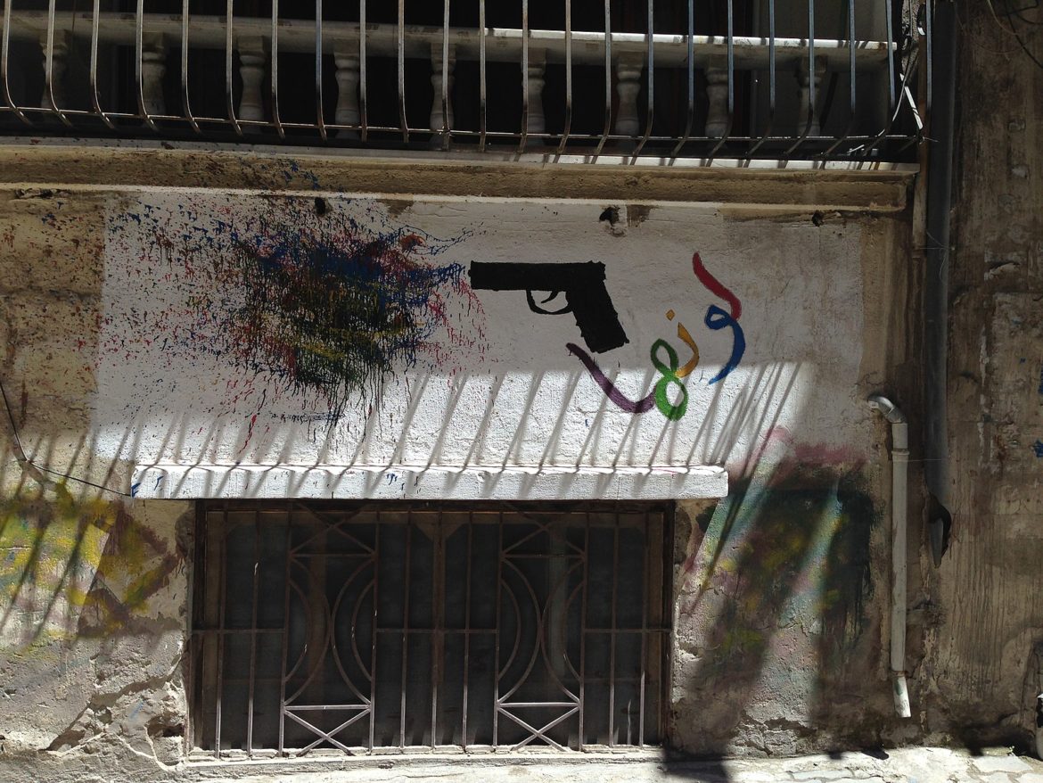 1600px-Murals_in_the_city_of_Homs,_Syria,_painted_in_2015_during_the_war_that_that_started_in_2011_and_devastated_the_country._09