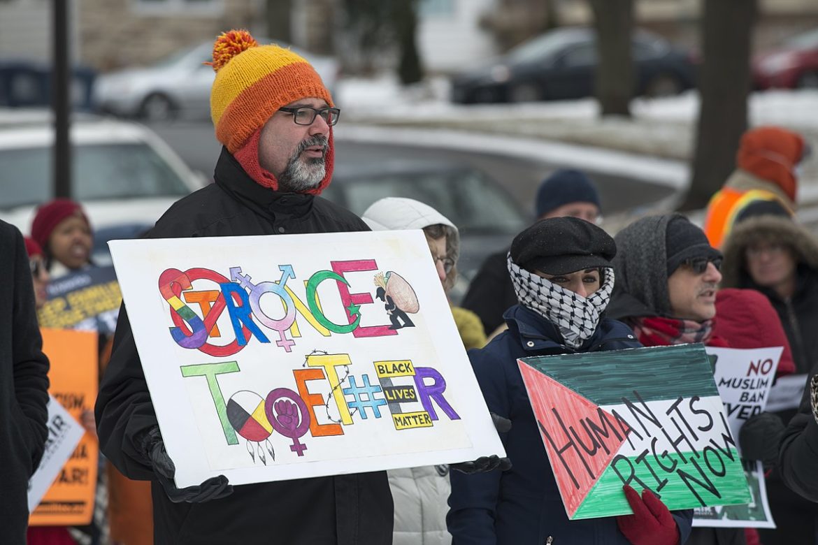 1200px-International_Human_Rights_Day_protest_march_against_war_and_against_deportations_(38256315304)